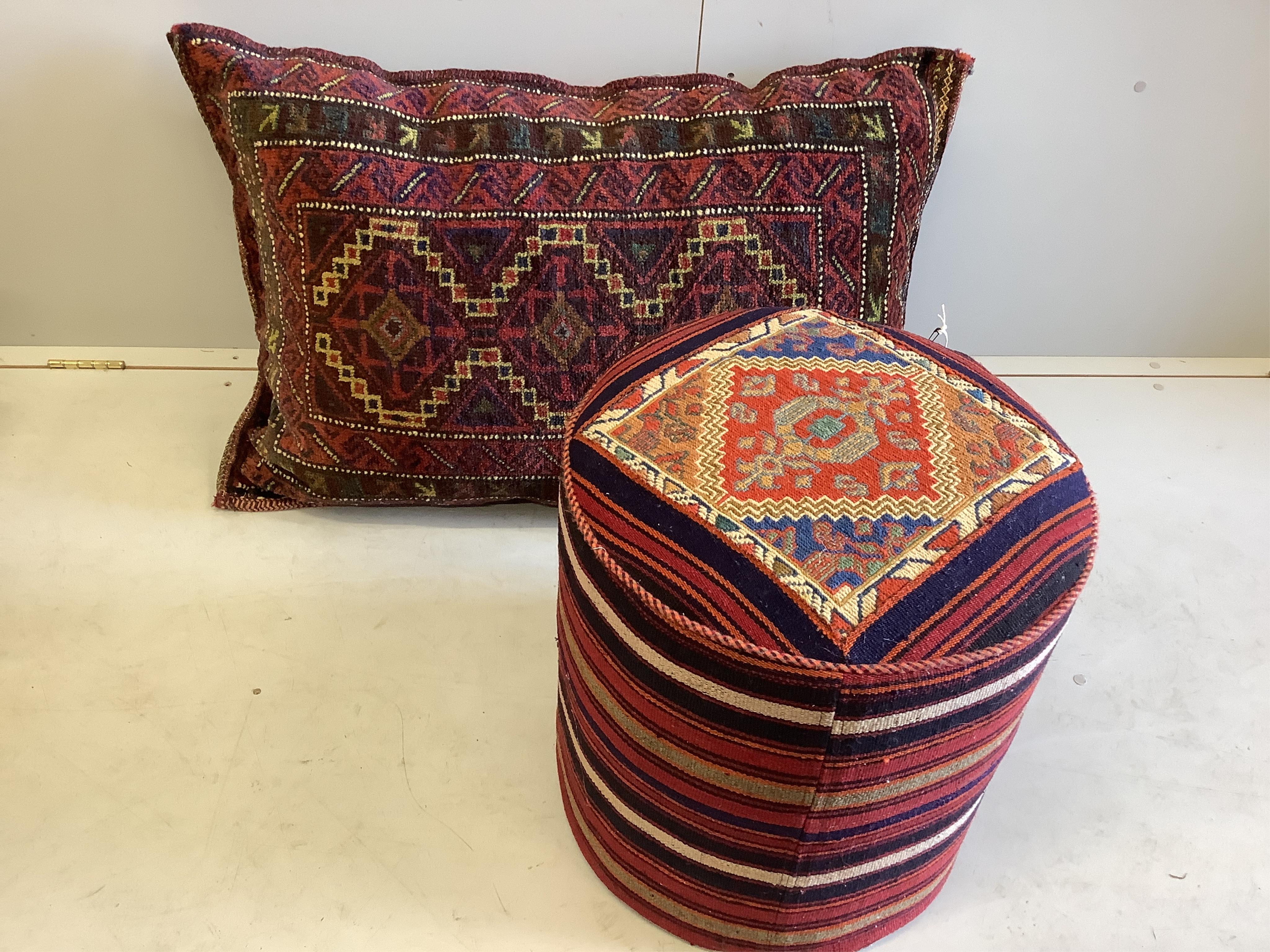A large Kilim floor cushion, 96 x 60cm, together with a circular stool. Condition - good